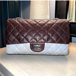 Caviar Iridescent Calfskin 2.55 Reissue 227 Flap
Brown Grey